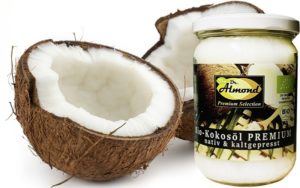 coconut cutted in half on white background