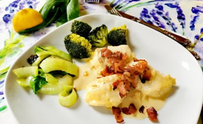 Fisch in sahne-Senf-Sauce